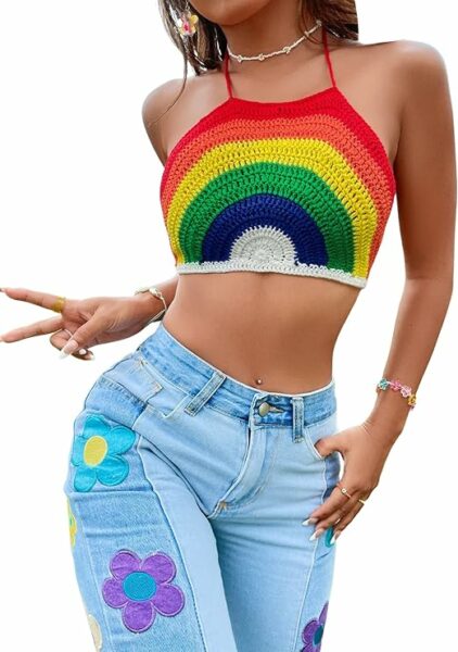 a woman wearing a rainbow colored top